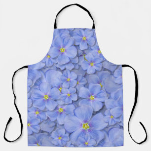 Delantal patrón sin costuras textil con flores azules. deco