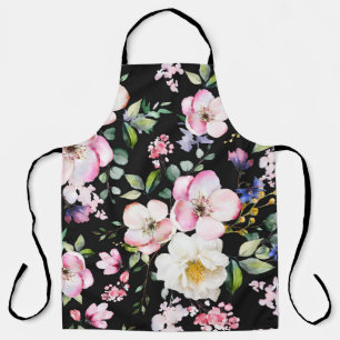 Delantal Patrón sin foco con flores primaverales y hojas.