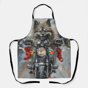 Delantal Perro Keeshond montando motocicleta Navidad