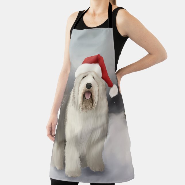 Delantal Perro pastor inglés antiguo en Navidad con nieve (in situ)
