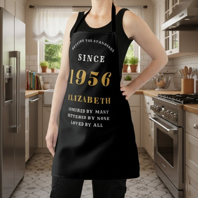 Delantal Personalized 70th Birthday 1956 Black & Gold (birthday 1956 apron worn in a kitchen.)