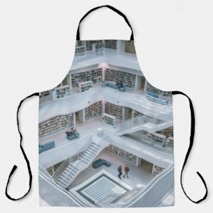 DELANTAL PERSONAS CAMINANDO DENTRO DE LA BIBLIOTECA