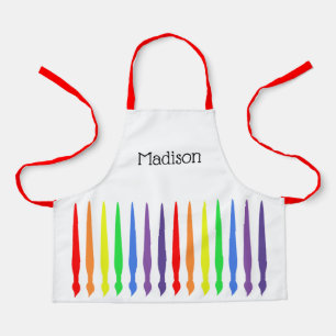 Delantal Pinceles de arcoiris y tu nombre en un niño