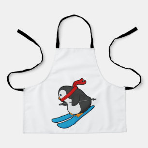 Delantal Pingüino como esquiador con esquí