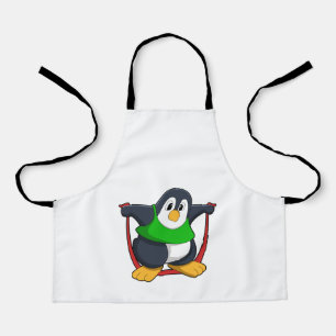 Delantal Pingüino en Gimnasio con cuerda para saltar.PNG