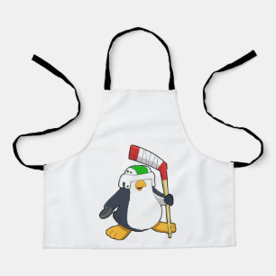 Delantal Pingüino en hockey sobre hielo con bastón de hocke