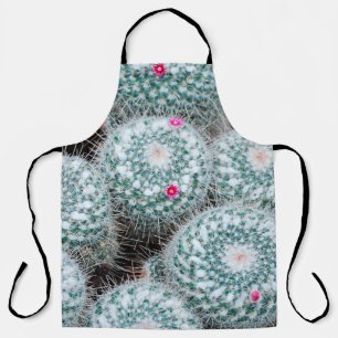 Delantal Plantas de cactus con flores rosadas muy pequeñas