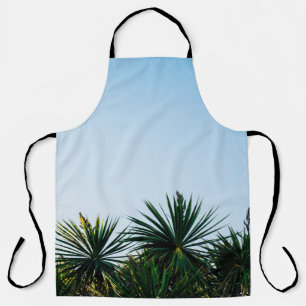 Delantal Plantas de hoja verde bajo cielo despejado