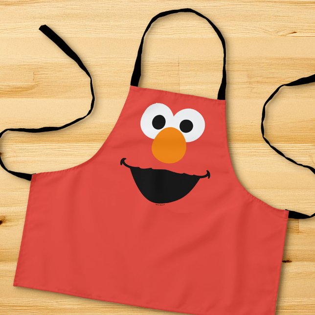 Delantal Plaza Elmo de Plaza Sésamo (Apron on counter)