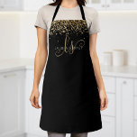 Delantal Purpurina dorado Glam Monograma Nombre<br><div class="desc">Purpurina Glam Gold Elegant Monograma Apron. Personaliza fácilmente este diseño de delantal de moda de moda con un elegante purpurina brillante de oro sobre un fondo negro. El diseño incluye su monograma manuscrito con remolques de bonito y su nombre.</div>