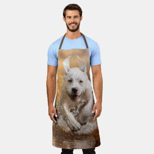 Delantal Recuperador de labrador corriendo en río Aprán