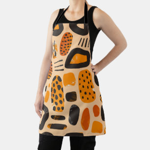 Delantal "Savanna Pop: Vibes tribales en Naranja y negro"