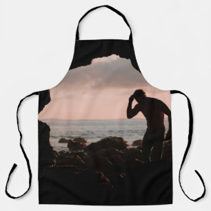 Delantal Silhouette of man in cave