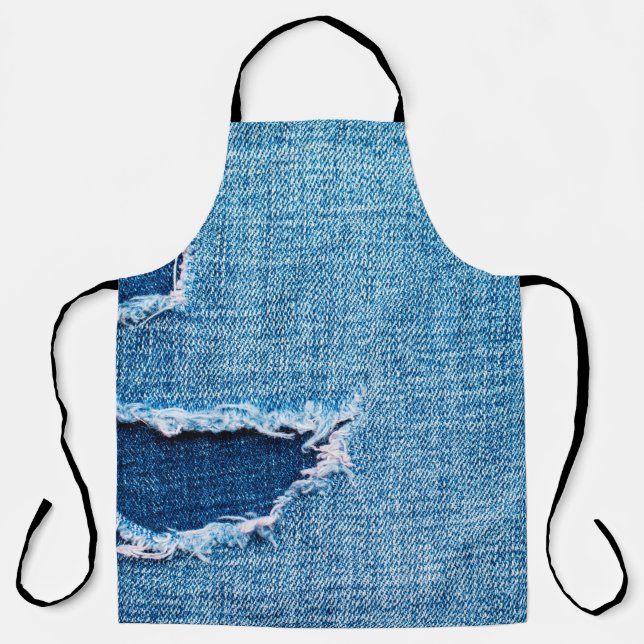 Delantal Textured denim background. Torn hole in the fabric (Anverso)