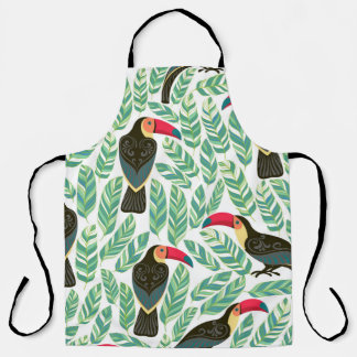Delantal Toucans, hojas tropicales, patrón decorativo.