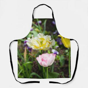 Delantal Tulipanes blancos, rosas y amarillos en el jardín