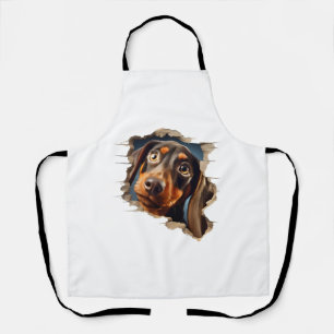 Delantal Un cachorro de dachshund aguijoneando