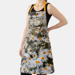 Delantal Un campo veraniego de daisies de Oxeye