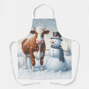 Delantal Vaca y muñeco de nieve en el campo invernal