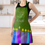 Delantal Velas de Hanukkah Menorah en luz verde de amor por<br><div class="desc">"Paz, amor y luz". Aquí hay una forma maravillosa de añadir a la diversión de sus vacaciones horneando. Añade brillo extra a tus aventuras culinarias vacacionales cuando usas este impresionante, colorido y personalizado delantal Hanukkah. Un ilustracion juguetón y artístico de velas de menorah azul con coloridos patrones de Relieve metalizado...</div>