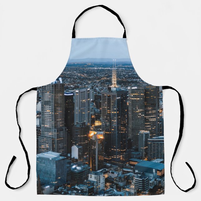 DELANTAL VISTA AÉREA DE LOS EDIFICIOS DE LA CIUDAD DURANTE  (Anverso)