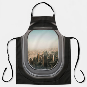 DELANTAL VISTA DE LA CIUDAD A TRAVÉS DEL AVIÓN DURANTE EL D