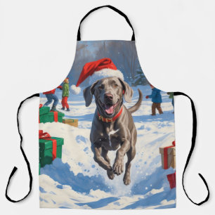 Delantal Weimaraner corriendo en la nieve con sombrero de N