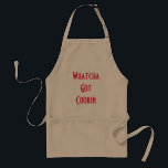 Delantal Whatcha divertido conseguido de cocinar el<br><div class="desc">Broncee el delantal con "Whatcha consiguió Cookin" en frente 
Perfeccione el regalo para todos como quienes estar en la cocina.</div>