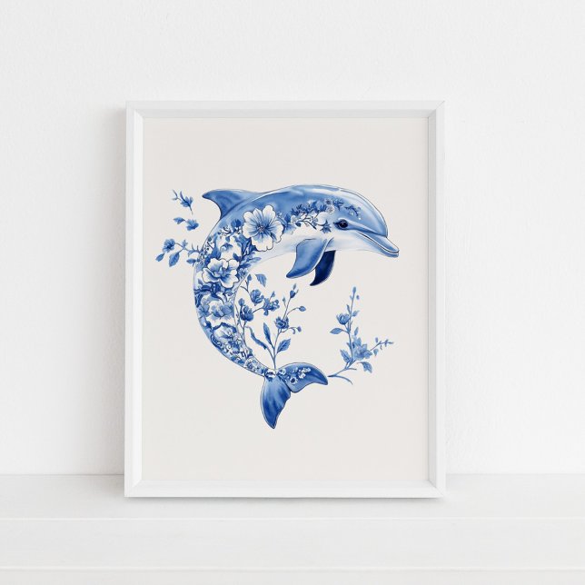 Delfín floral - Azul costero en arte de pared beig (Floral Dolphin – Coastal Blue on Beige Wall Art in a white frame on the floor.)