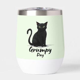 Día gruñón con gato negro