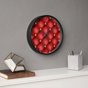 Diamante dorado con reloj de pared negro y rojo