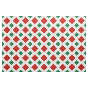 Diamantes rojos y verdes en la tela geométrica