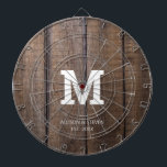 Diana Monograma de la familia Rustic Brown Faux Wood Per<br><div class="desc">Un juego de dardos es siempre divertido para amigos y familiares. Este Rustic Brown Faux Wood Family Monograma Personalizado Dart Board está diseñado con una gran inicial blanca en negrita en el centro. Se personaliza con sus nombres y apellidos y se establece año tras año en pequeñas letras simples a...</div>