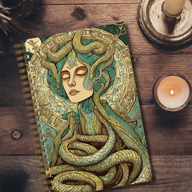 Diario de Sueño de Mujer Serpiente (Green and gold journal featuring a woman encoiled in snakes in an art nouveau style.)