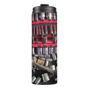 Diferentes zócalos en un vaso de herramientas