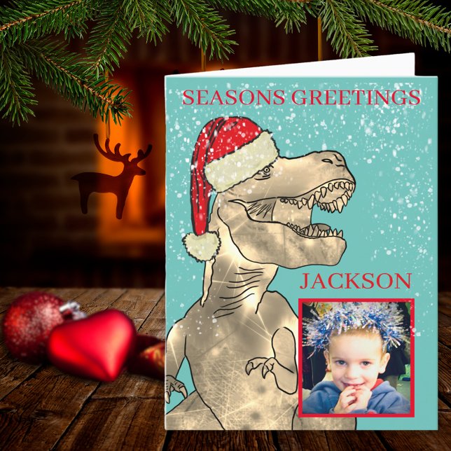 Dinosaurio de Navidad T-Rex agregar foto (Christmas dinosaur T-Rex wearing a Santa hat seasons greetings photo template holiday folded card)