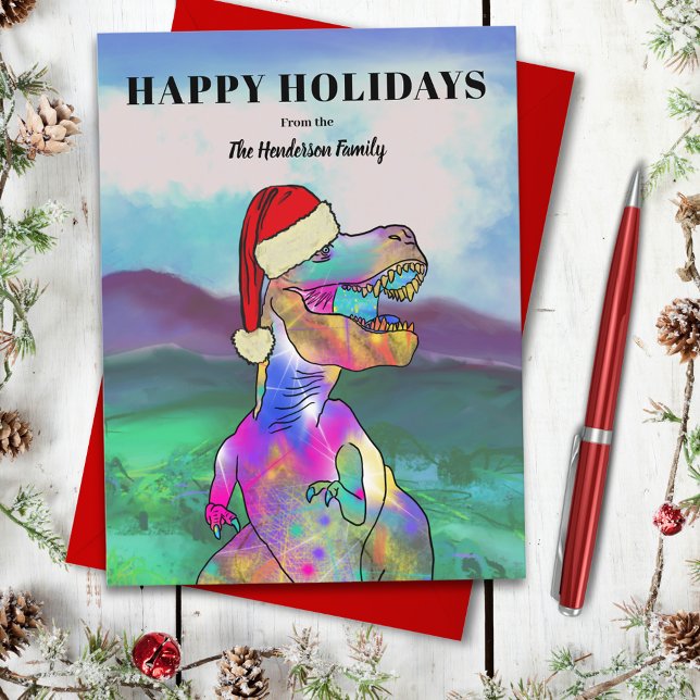 Dinosaurio T-Rex de Navidad Familiar Personalizado (Christmas dinosaur T-Rex wearing Santa hat colorful custom family name happy holiday greetings card)