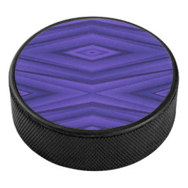 Disco De Hockey A hockey puck with a vibrant purple geometric 