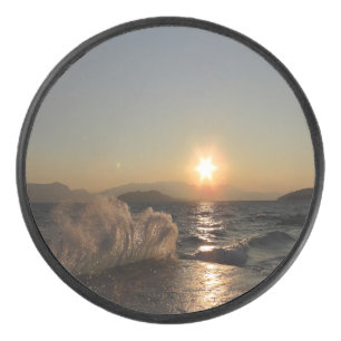 Disco De Hockey Aguas rompeolas en Croacia hermosa puesta de sol
