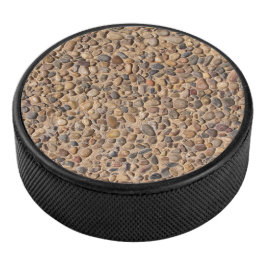 Disco De Hockey Foto de piedras de guijarros en bruto