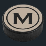 Disco De Hockey Monograma negro simple inicial<br><div class="desc">El diseño mínimo monogramado presenta un medallón monograma negro y beige en una tipografía blanca clásica de bloques. Personaliza con tu inicial.</div>