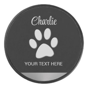 Disco De Hockey Paw de perro plateado sobre fondo negro