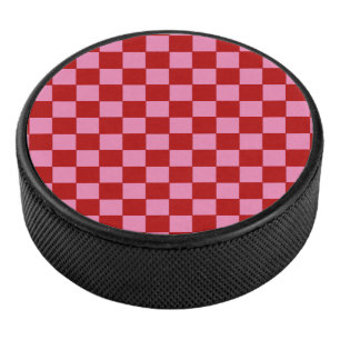 Disco De Hockey Rojo y rosado caliente bajo control