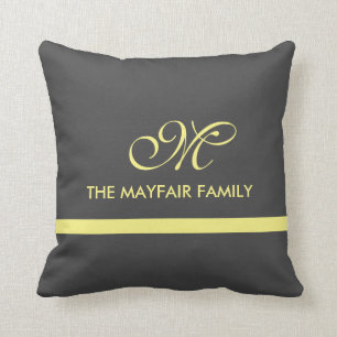 Diseño amarillo gris de la almohada del monograma