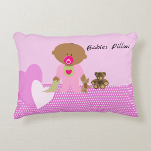 Diseño de almohada para bebés en tonos rosados par