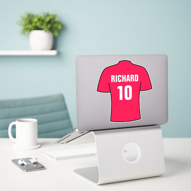 Diseño de camisas de fútbol en rojo. pegatina (Ordenado portátil  en el escritorio)