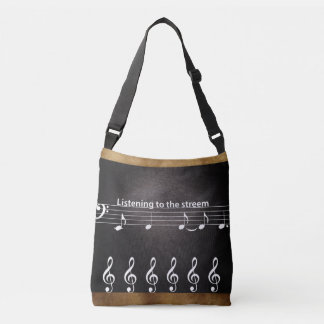Diseño de cuero con bolso de mano de nota musical
