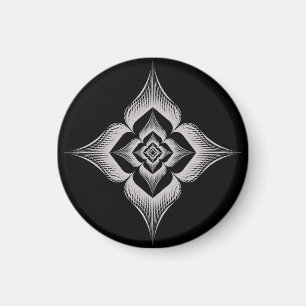 diseño de flores sobre imán redondo de fondo negro