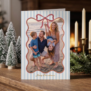 Diseño de lazo rayado azul Feliz Navidad Foto