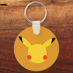 Diseño de llavero circular con cara de Pikachu